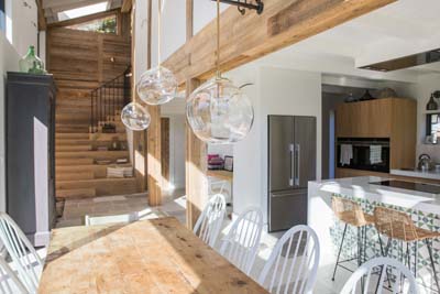 Reclaimed boards and beams in alps house interior