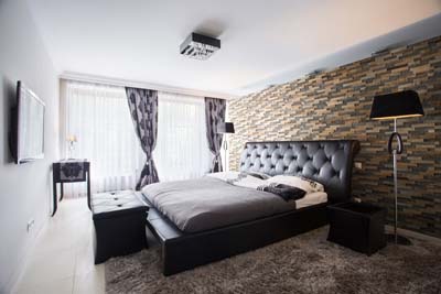Reclaimed wood panels in bedroom interior