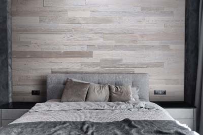 Bedroom wall with reclaimed wood panels whitewash 