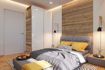 Brushed boards in bedroom interior with yellow pillows