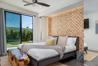 Solid wood wall panel in bedroom interior 