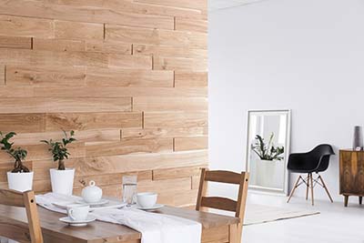 oak wall panels behind dining table 