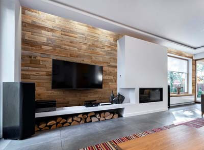 reclaimed wood behind tv white interior 