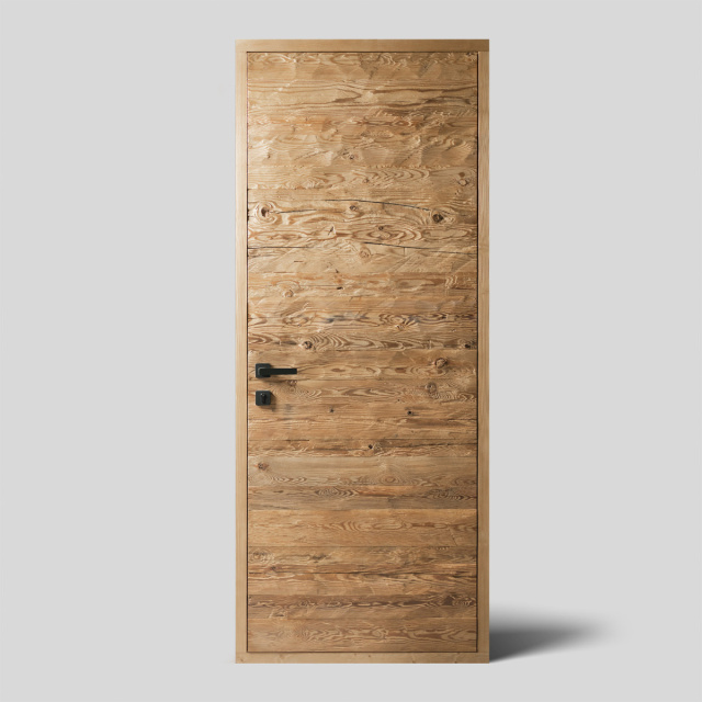 Interior door made from reclaimed hand-hewn wood