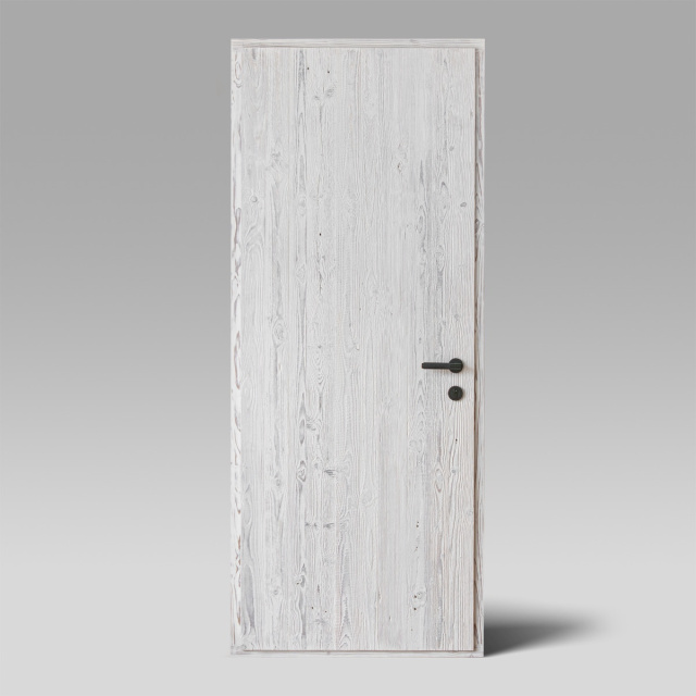 surface de porte en vieux bois avec une finition blanchie à la chaux