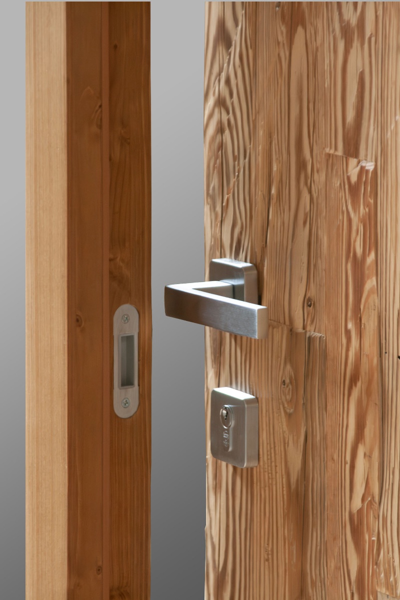 door surface made from solid reclaimed hand-hewn wood