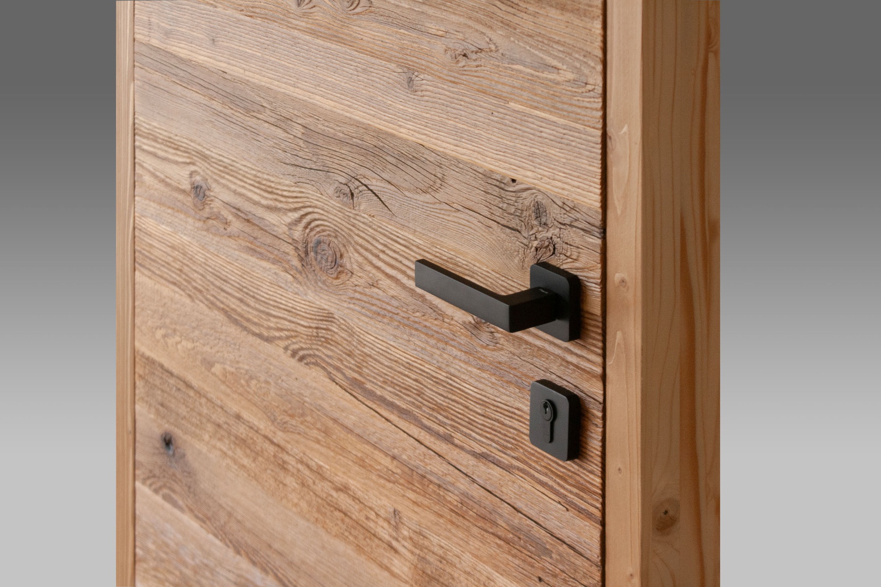 door surface made from reclaimed weather sun burned brushed wood